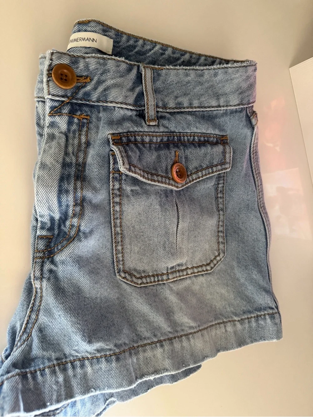 Zimmermann Light Wash High-Rise Denim Short with Front Flap Pockets - Picture 4 of 6